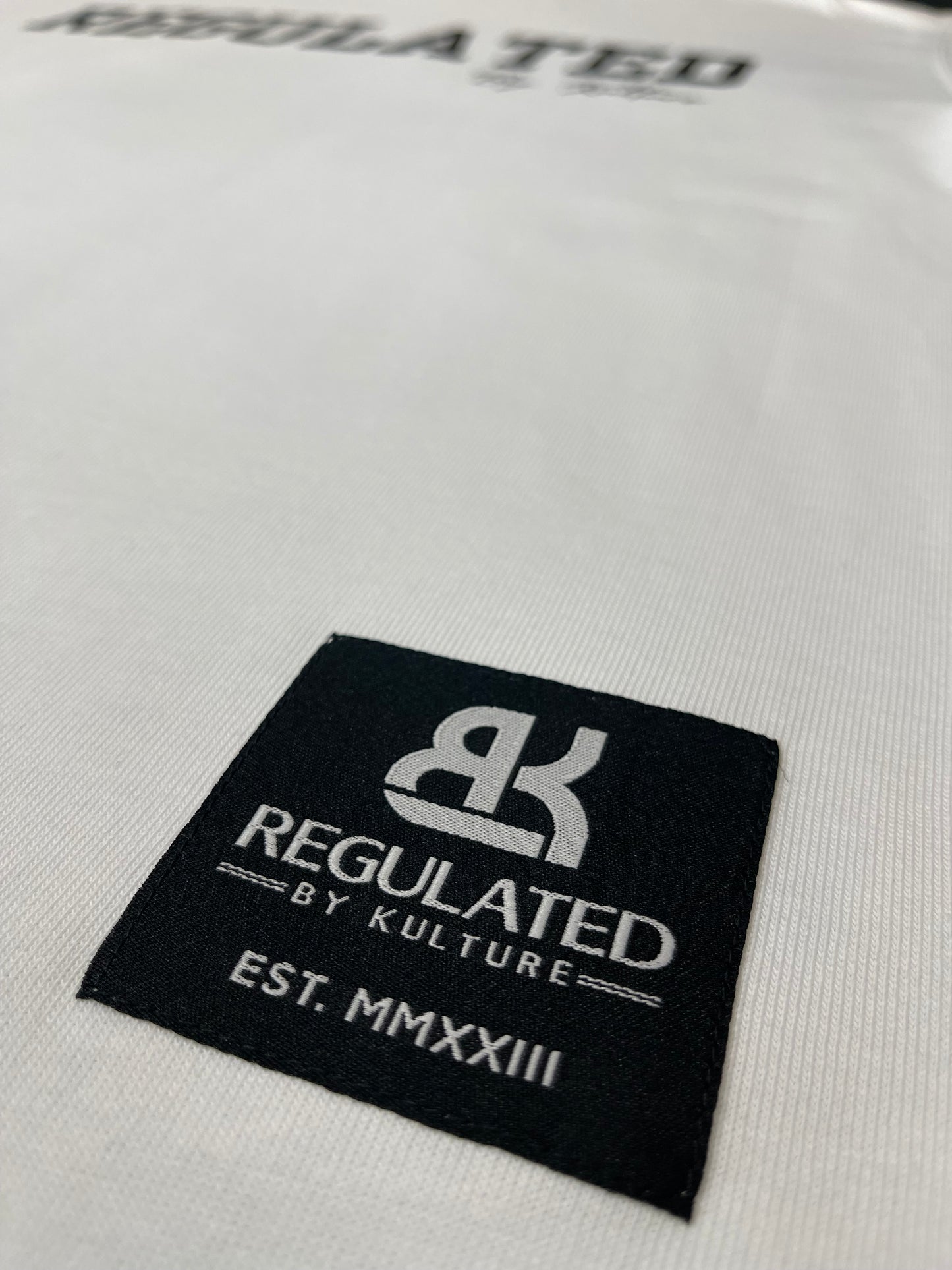 RegulatedByKulture - White Tee