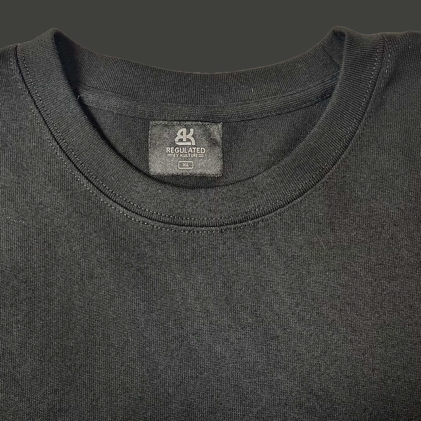 RegulatedByKulture - Black Tee